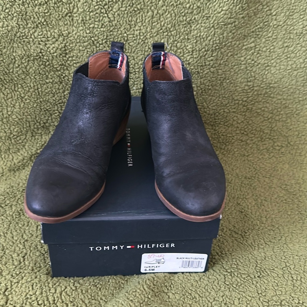 Black leather bootie for women by Tommy Hilfiger with 1.5 inches block heels